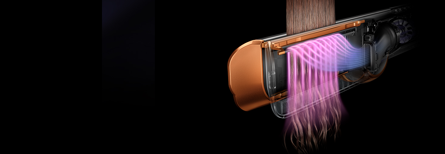 Proud vzduchu vlasy urovná a pomáhá vytvořit hladký účes